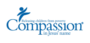 Compassion International logo with the tagline Releasing children from poverty in Jesus name.